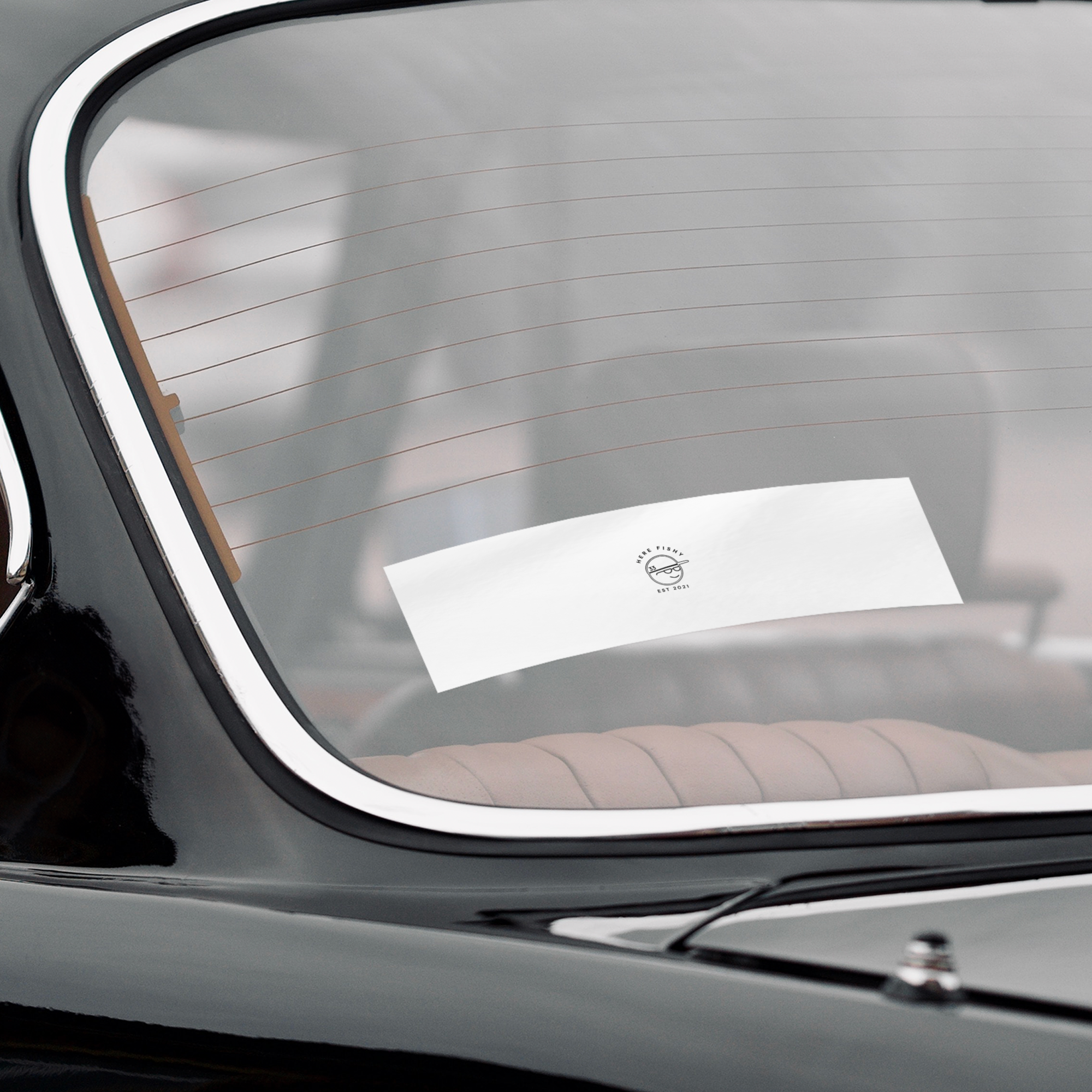 Here_Fishy_Bumper_Sticker_WhiteBumperSticker-Windshield_Mockup.png_15756691